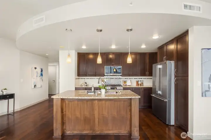 Cooks will appreciate the open, island-style kitchen.