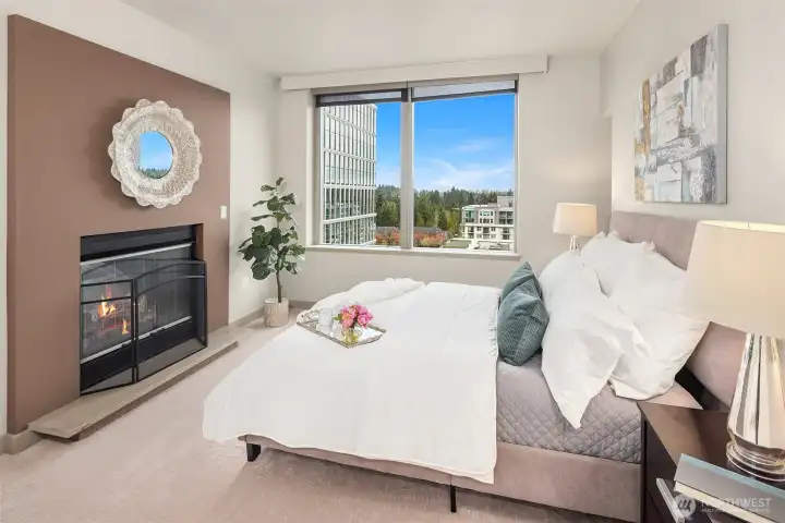 Retreat to your primary suite, also enjoying the 2-sided gas fireplace.