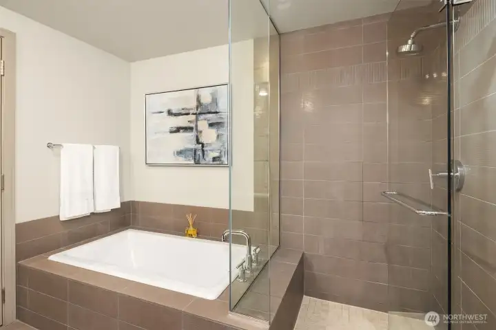 Walk-in shower + separate soaking tub for relaxing your cares away.