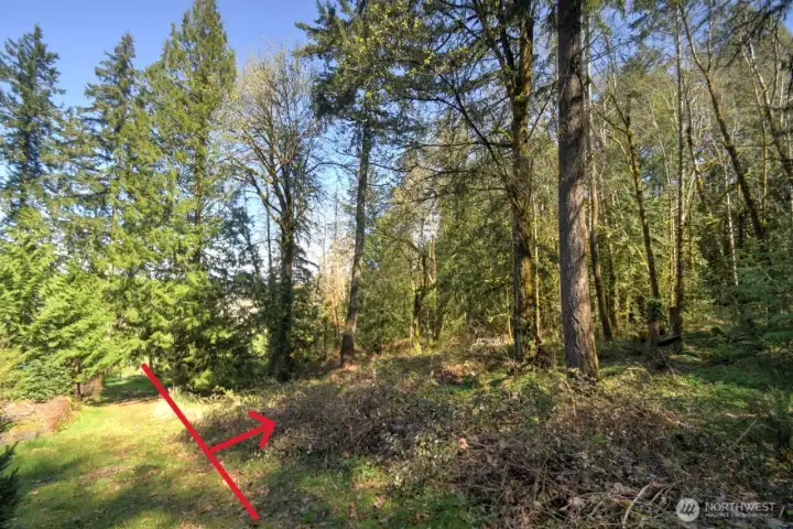 Path located on the west side of the property is on the neighbor's property with subject property located on the eastern side of the path.