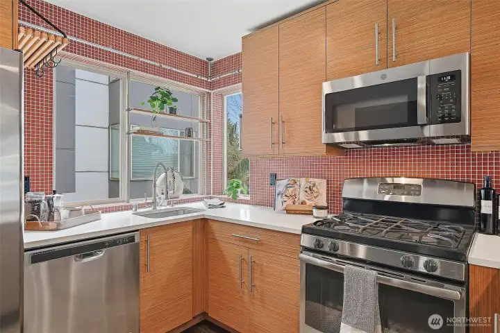 Window shelves have space to grow fresh potted herbs!