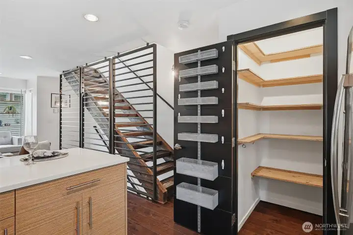 The spacious walk-in pantry has abundant room to store Costco-sized purchases.