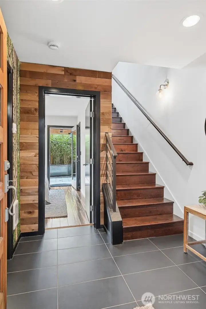 Bedrooms are nicely separated from living areas, with one on the lower floor and one on the upper! Coat closet to right at entry not pictured.