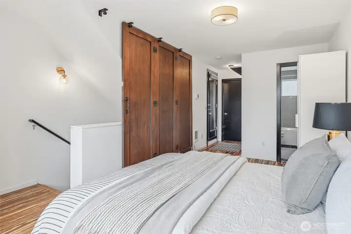 On the top level, a spacious and stylish primary retreat awaits.