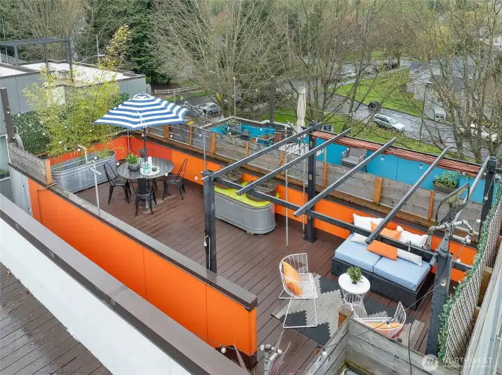 Shade cloth on the pergola makes it a great place to relax on hot summer days.