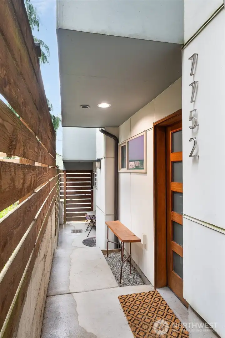 Sweet inviting entryway with privacy walls from neighbors - no HOA, by the way!