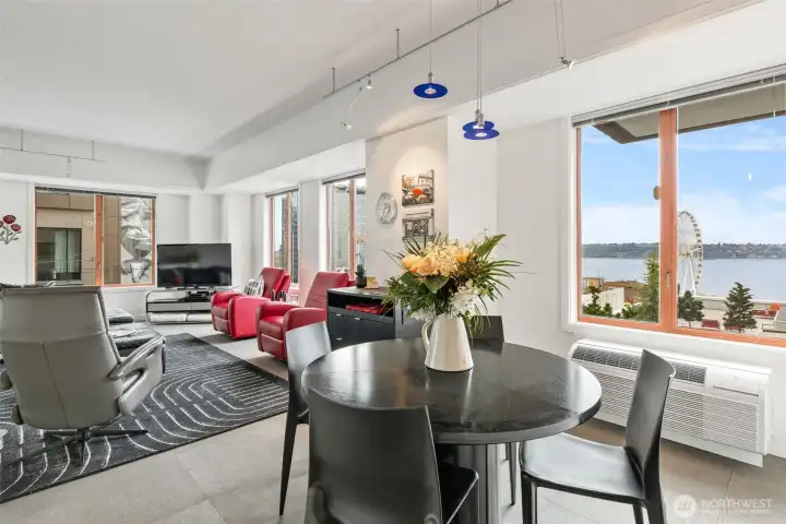 Dining area set beside the windows—perfect for meals with a view.
