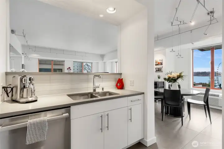 Bosch Dishwasher, GE Profile Range, Fisher & Paykel Refrigerator