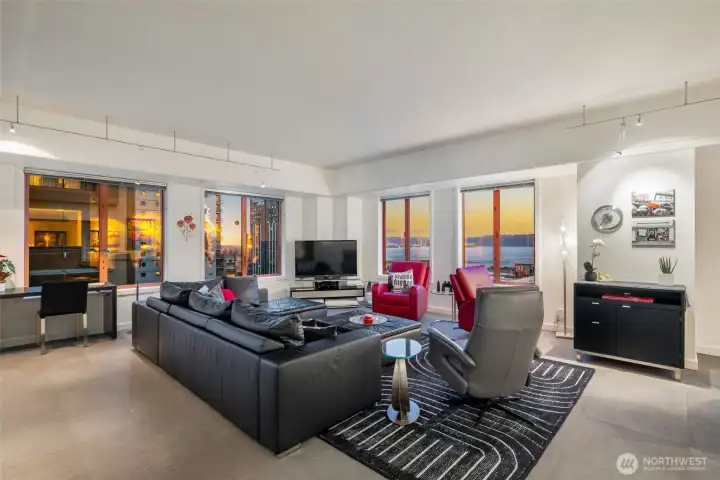 Tile flooring throughout living, dining, hall and kitchen.