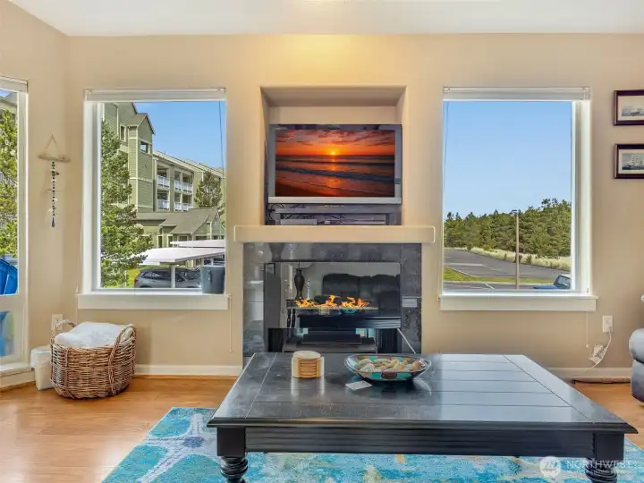 Upstairs living with large windows overlooking the dunes and the beach.