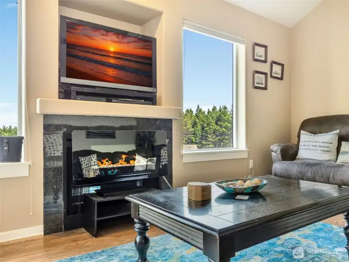 Large living area upstairs with dedicated living room, dining space, kitchen, storage and an upstairs additional bedroom and bathroom.