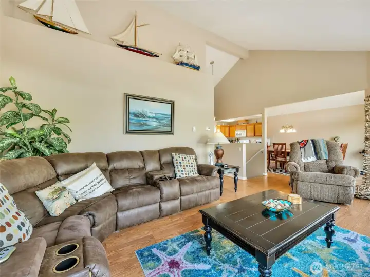 Large living area upstairs with dedicated living room, dining space, kitchen, storage and an upstairs additional bedroom and bathroom.