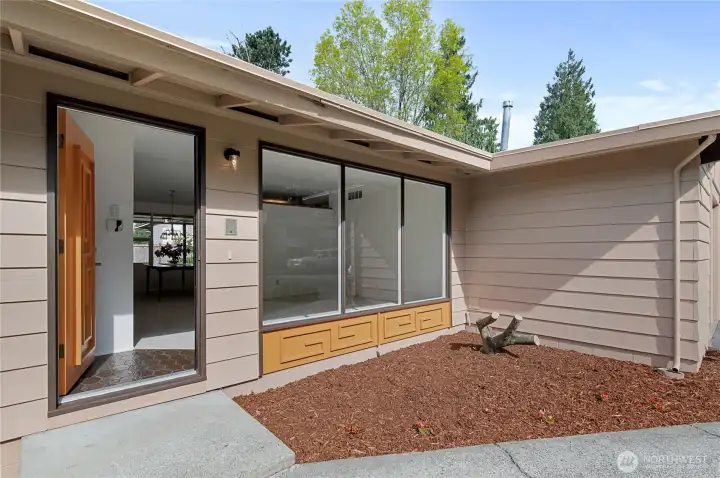 front of house showing huge windows