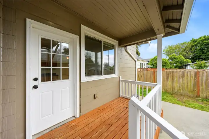 Back Porch leading out to BBQ space Back Porch leading out to BBQ space