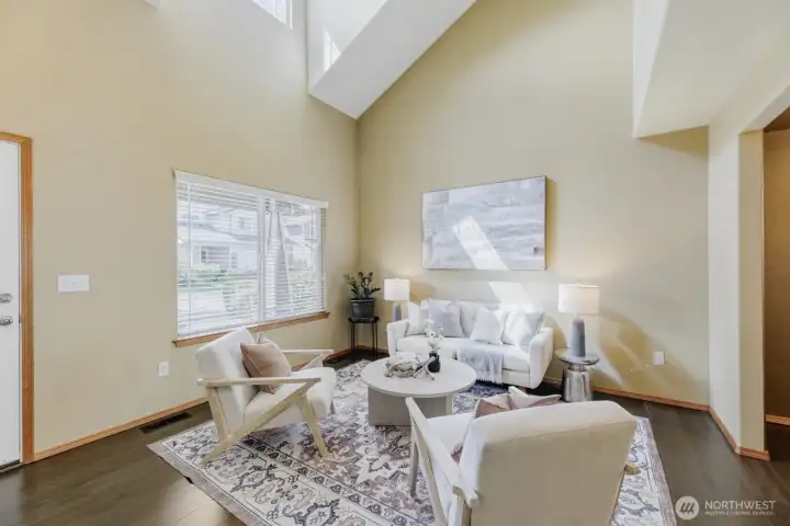BEAUTIFUL LIVING ROOM W/ EASY ACCESS TO FORMAL DINING AREA.