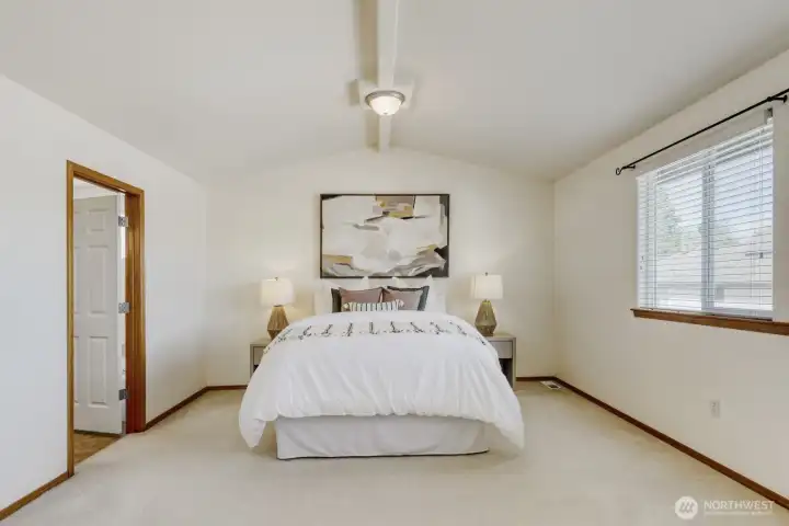 RESTFUL PRIMARY BEDROOM - QUIET AND RELAXING, EASILY FITS A KING BED W/ ROOM FOR FURNITURE.