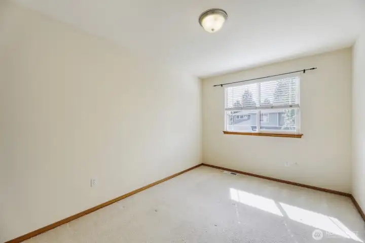 QUIET THIRD BEDROOM UPSTAIRS W/ WALK-IN CLOSET.