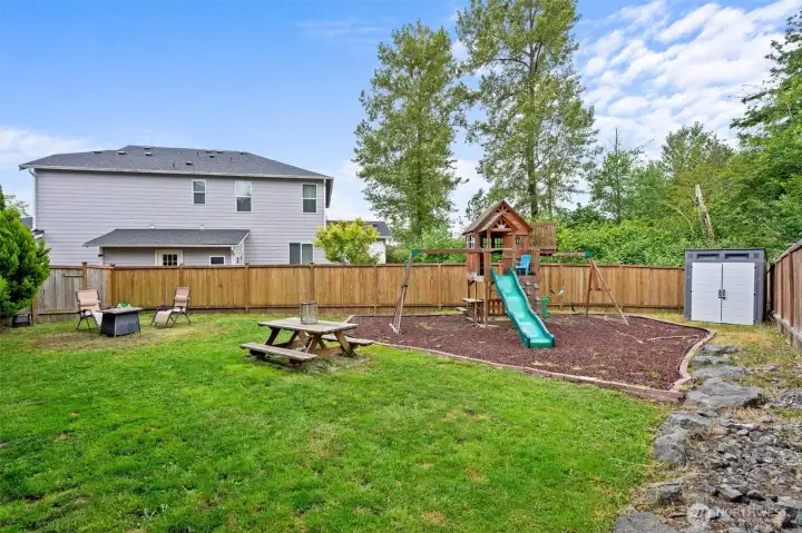 BIG yard, complete with picnic table & playset. BIG yard, complete with picnic table & playset.