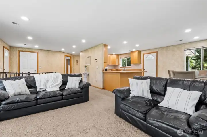Living Room looking to kitchen and dining