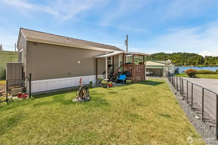 Nice grassy area perfect for gardening or pets.