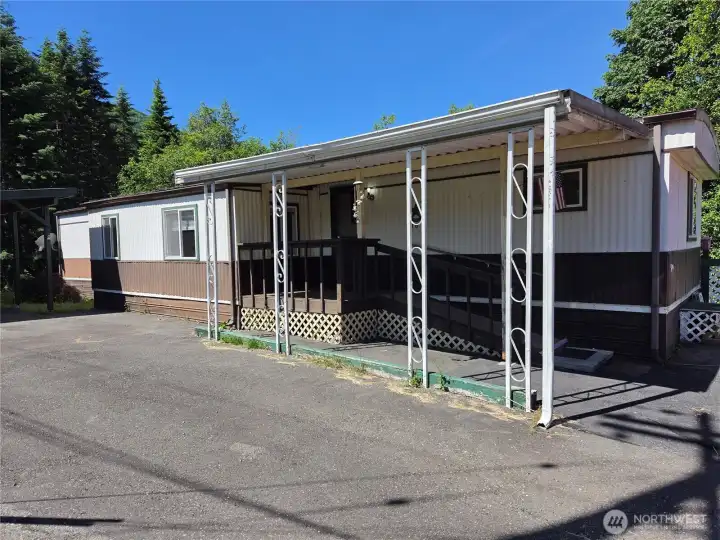 Factory covered porch with ramp at the front door