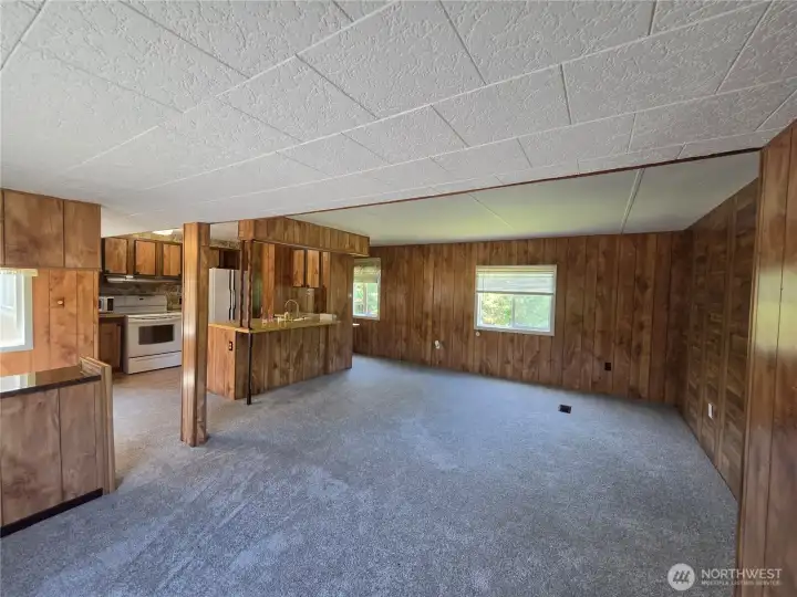 Spacious living room with updated carpeting