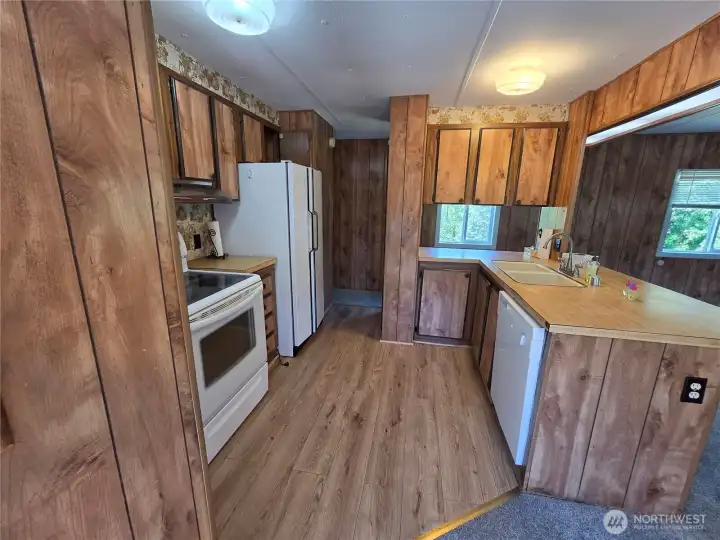 Updated flooring and appliances in this efficient kitchen space