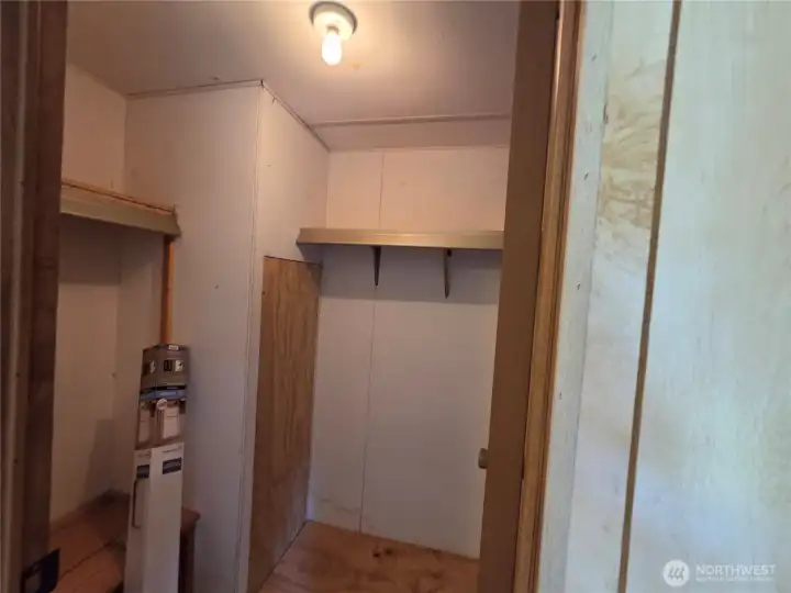 Primary bedroom walk-in closet
