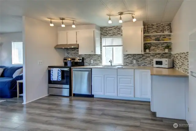 White cabinets and all stainless steel appliances stay