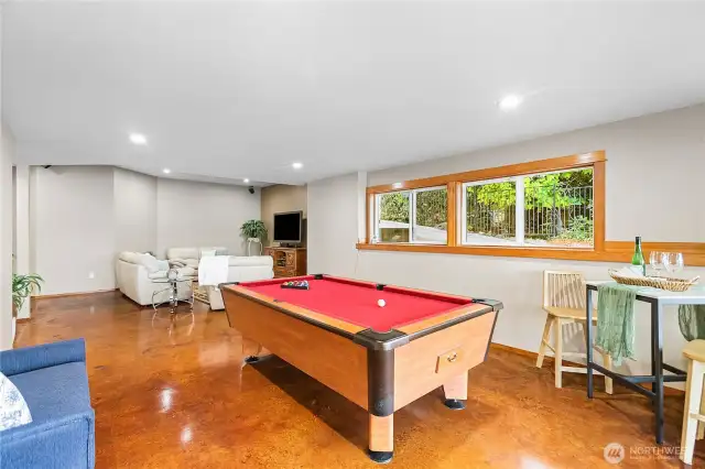 Lower level has heated concrete floors and huge family room with pool table