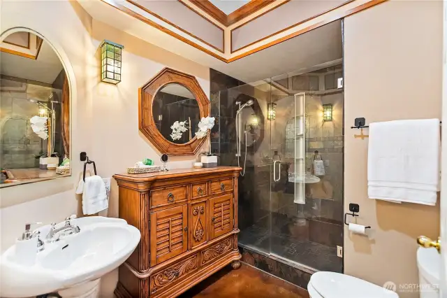 Lower Level slate shower and custom woodwork.
