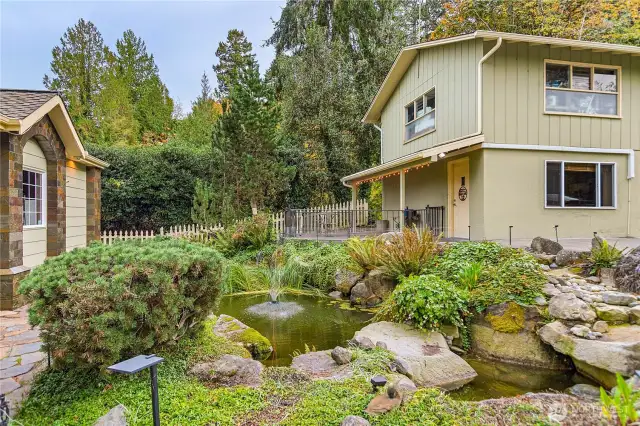 The Studio is below the detached 2 car garage and looks out at the Pond.