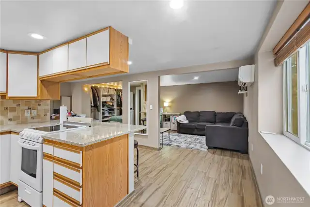 Studio interior, including washer dryer, mini split air/heat and beautiful bathroom