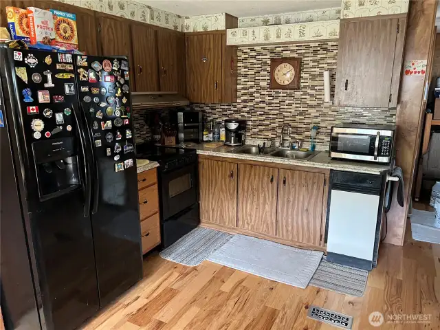 Kitchen with newer appliances.