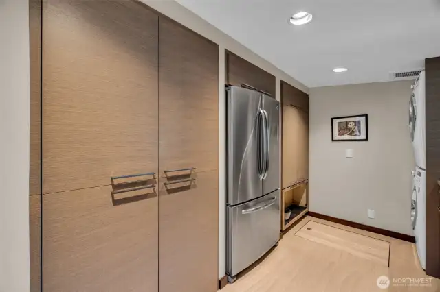 The pantry includes a  second refrigerator for Island provisions.