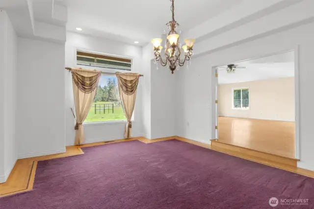 Formal dining room with French door access to family room/kitchen/great room.