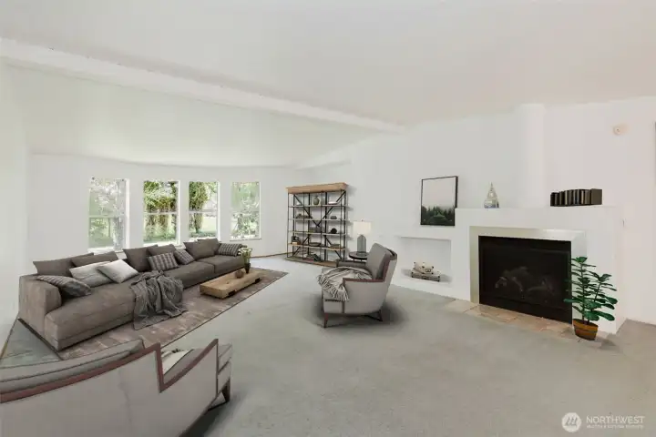 Just off the living room, a spacious great room forms an L-shape with the dining area and kitchen, creating a seamless and inviting layout for everyday living and entertaining. Virtually Staged.