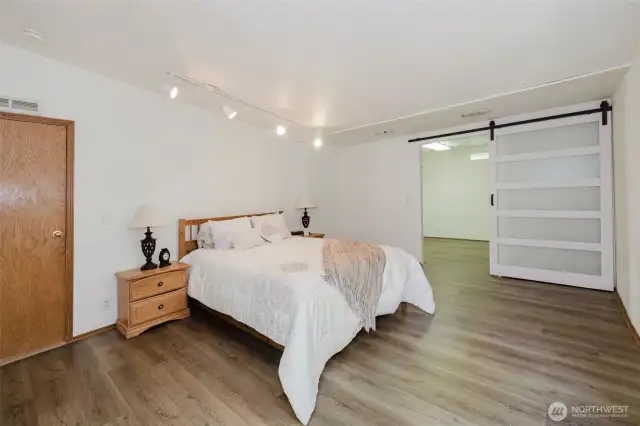 The generously sized primary bedroom offers plenty of space for relaxation and customization.