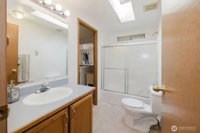 Main bath with plenty of light.