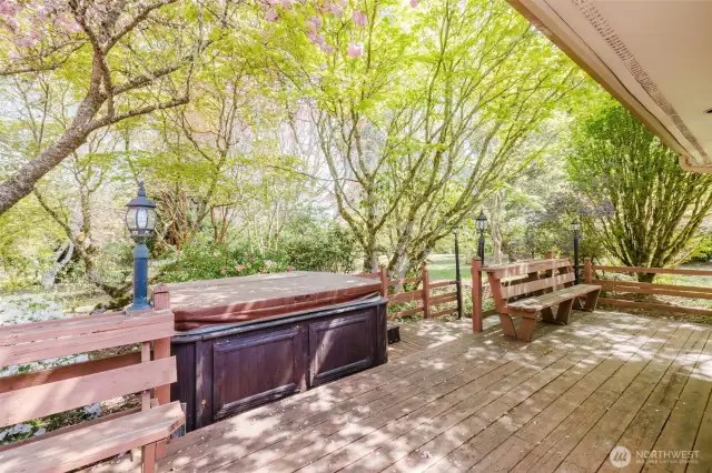 A hot tub awaits on the spacious deck—perfect for unwinding under the stars. While the previous tenants reported it was in working condition, it has not been tested by the current owners and is being offered as-is.
