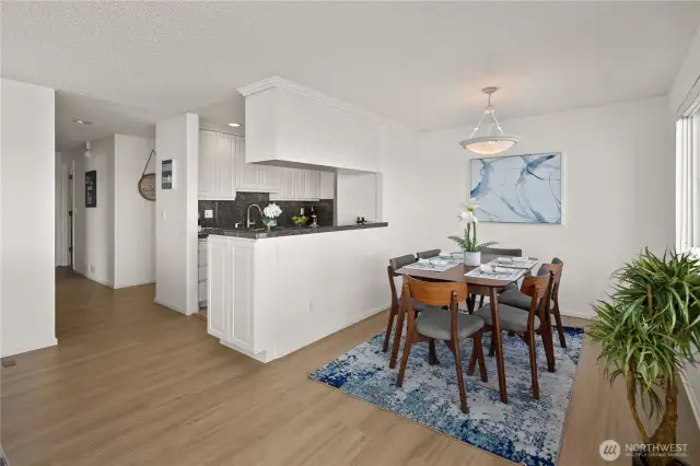 Looking from the living room towards the dining and kitchen spaces