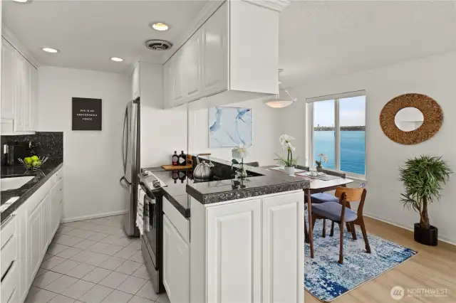 Everything is within easy reach in the kitchen with granite counter tops, new fridge and stove/oven.