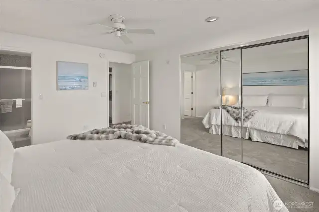 Primary bedroom features a view to the Kirkland marina and lake, and a ¾ ensuite bathroom.