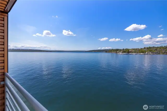 Step into the living room and take in the stunning view from the open sliding door—breathtaking scenery that’s hard to beat!