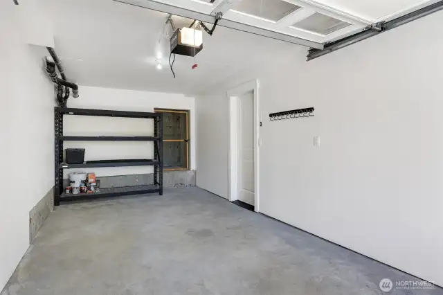 Full size attached garage with large secured storage space for bikes, skis, paddle boards, kayaks, gear.