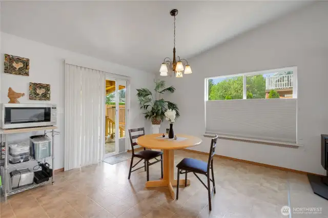 Kitchen with eating space that opens to the covered deck.