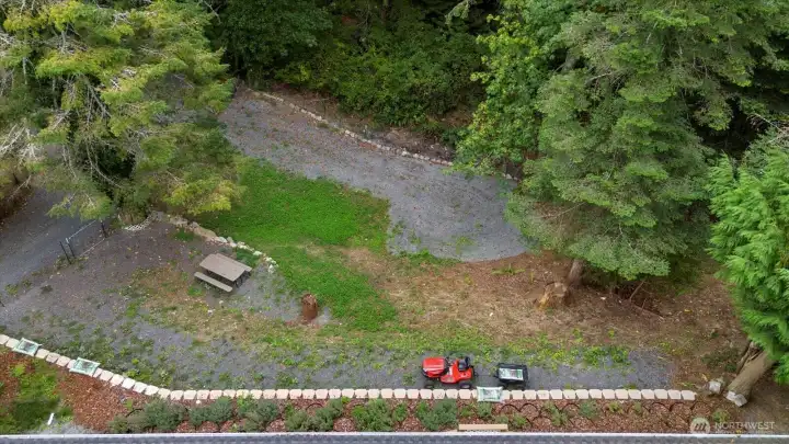 Drone shot of property, extra RV parking