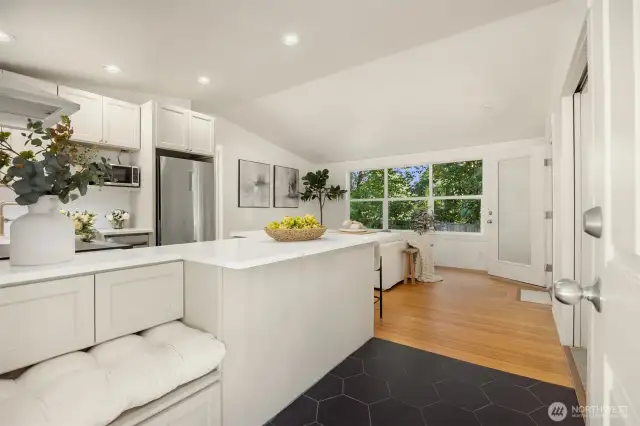 Thoughtfully redesigned with you in mind to include a bench with a shoe cabinet below and a drop cabinet at your back.
