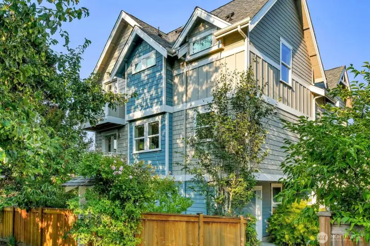 Great street presence, yet afforded privacy by the mature trees.