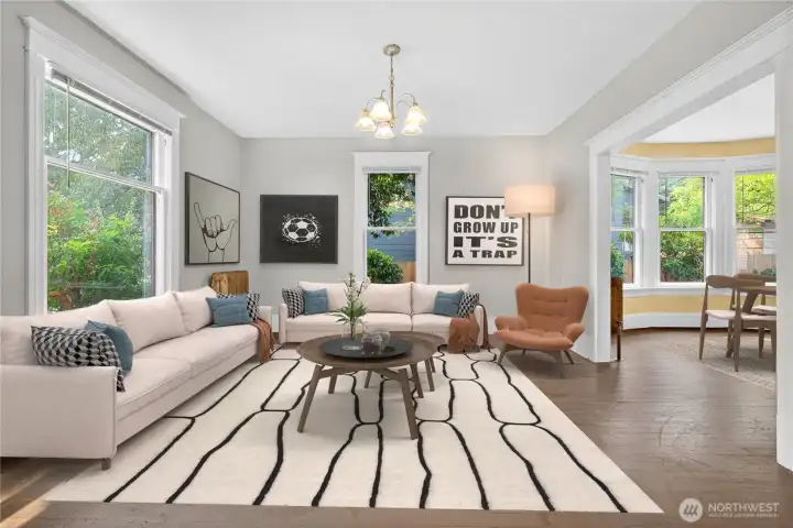 Spacious Living room with plenty of natural light. (Virtually Staged.)
